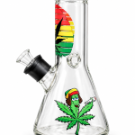 Rasta Leaf Character Beaker Glass Bong with rasta striped neck artwork, a cartoon leaf character on the base and a clear glass bowl